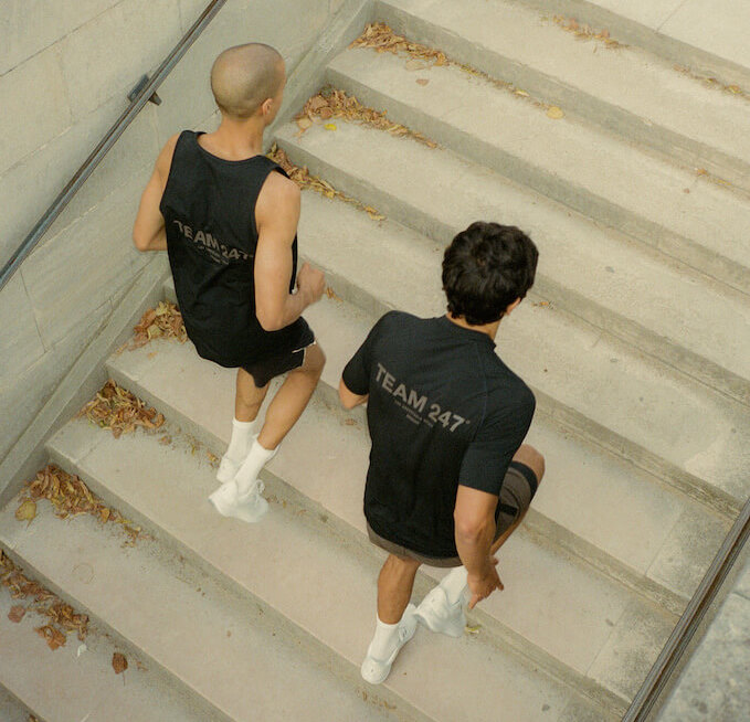 Two men running wearing the Represent 247 Run collection