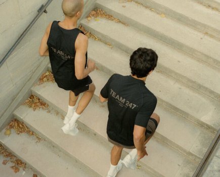 Two men running wearing the Represent 247 Run collection