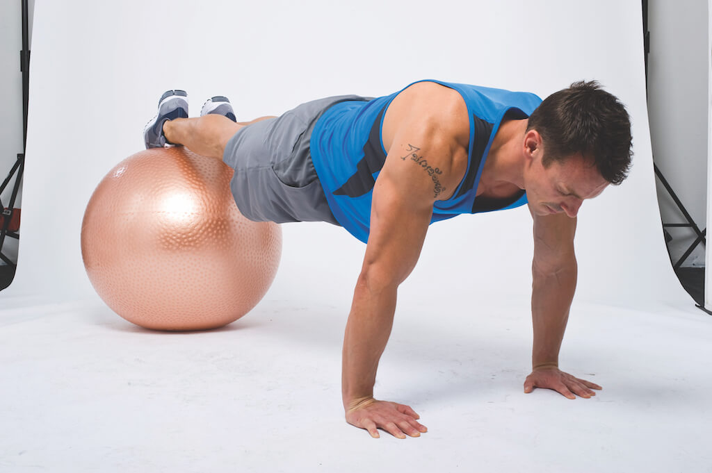 The Dumbbell Gym Ball Workout To Amplify Your Abs Workout – Men's Fitness UK