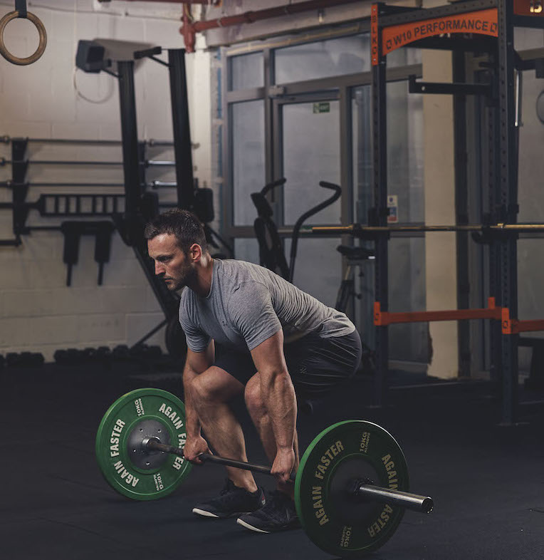 Man demonstrating the Barbell Clean and Jerk 1
