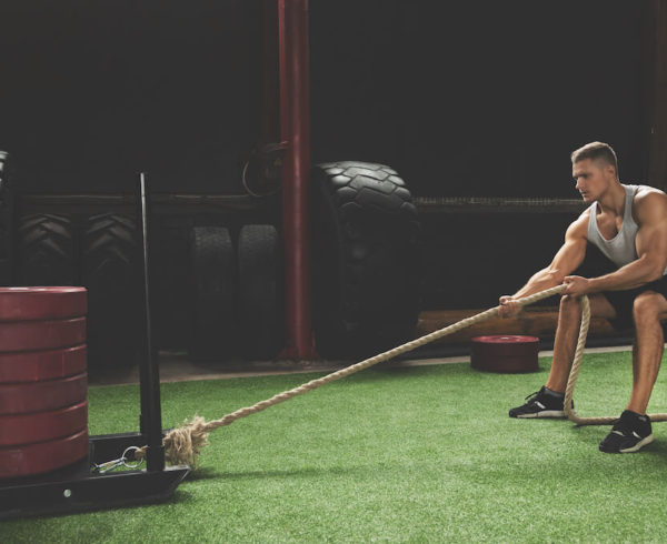 Man performing the HYROX Sled Pull