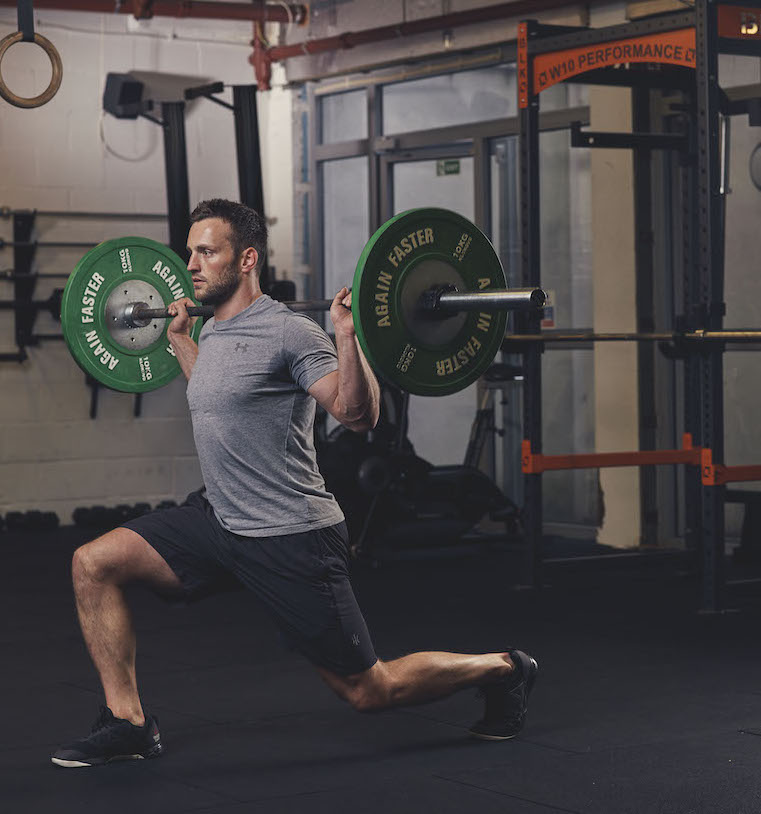 Man demonstrating a Barbell Lunge