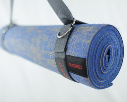A rolled up Sundried Jute yoga mat