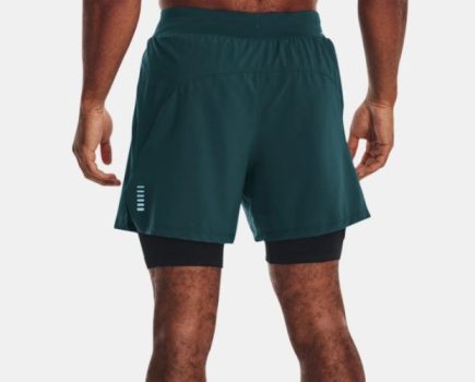 A man's lower body wearing Under Armour Iso-Chill Run 2-in-1 Shorts